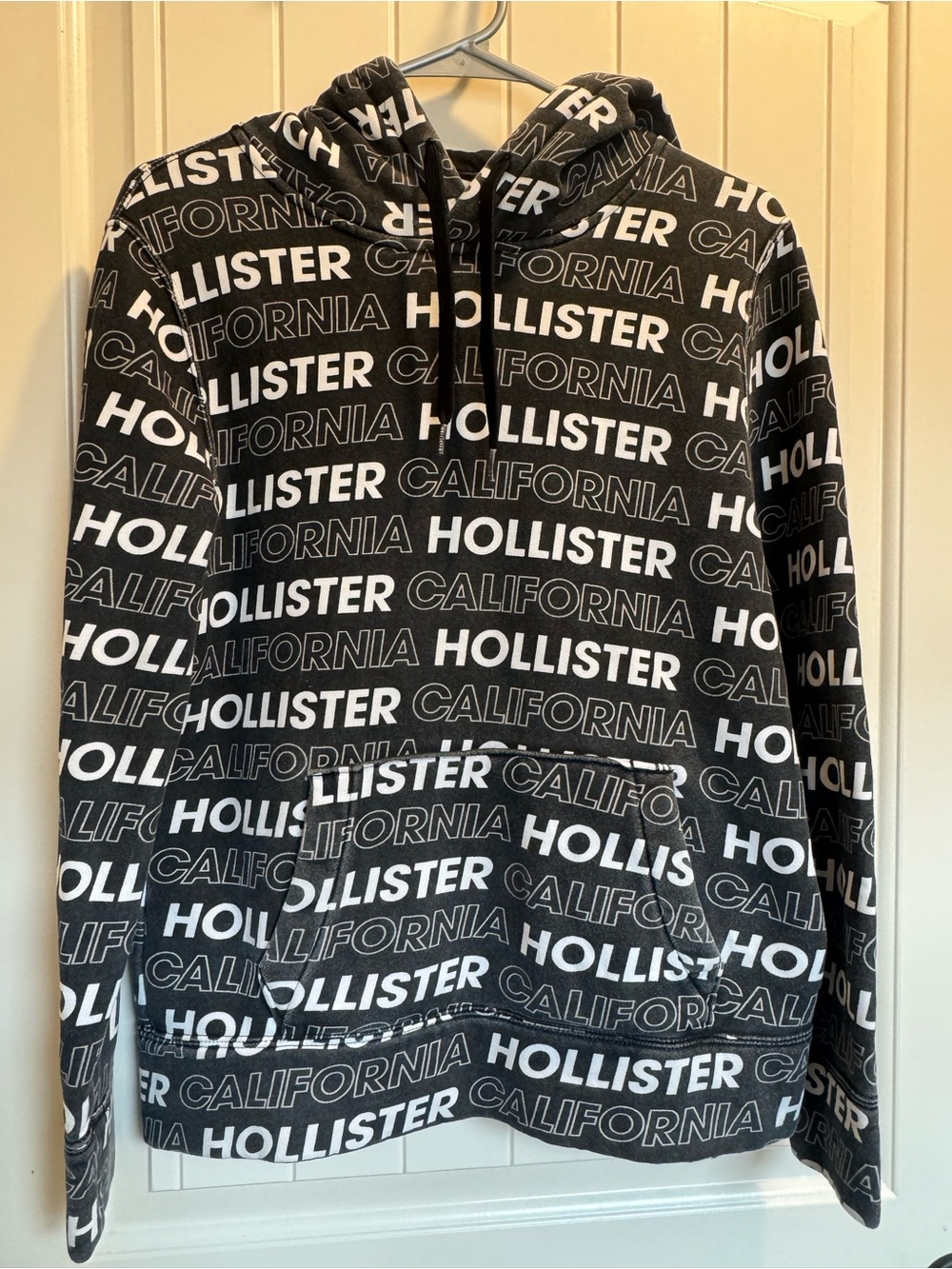 Hollister Black Hoodie with White All-Over Logo Print